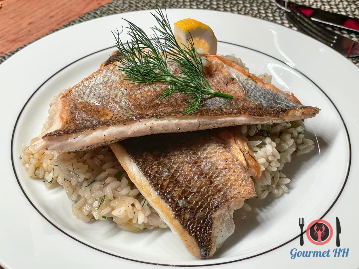 Bild: Auf der Haut gebratene Doradenfilets mit Zitronenrisotto